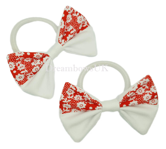Red and white floral fabric hair bows on thick bobbles