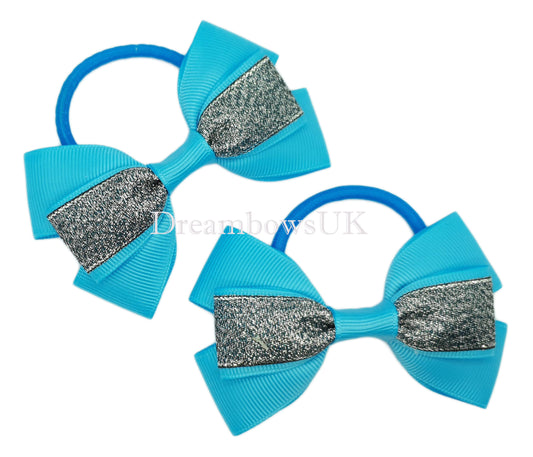 Black and turquoise glitter hair bows on thick bobbles