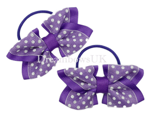 Purple polka dot hair bows on thin bobbles