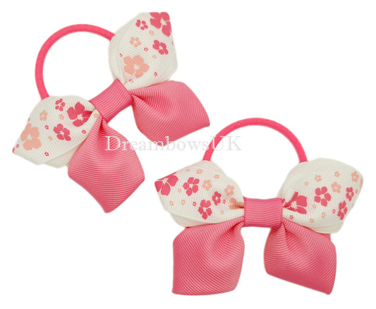Pink and white floral hair bows on thick bobbles