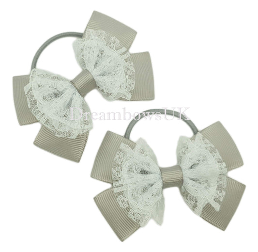 Silver lace hair bows on thin bobbles
