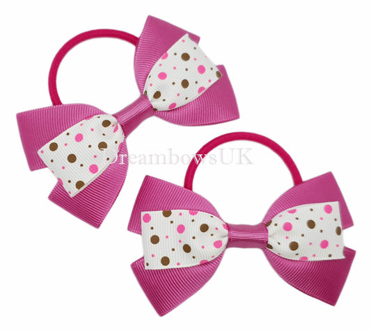 Pink polka dot hair bows on thick bobbles