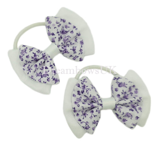 Floral fabric hair bows on thin bobbles