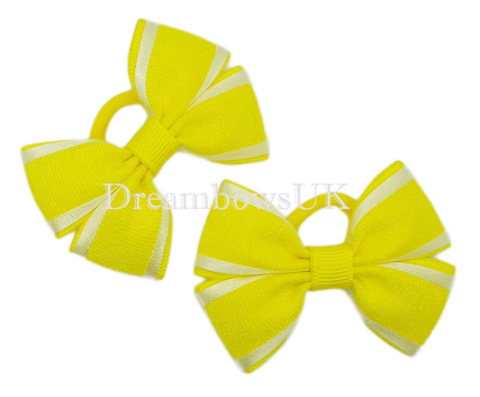 Yellow organza hair bows on polyester bobbles