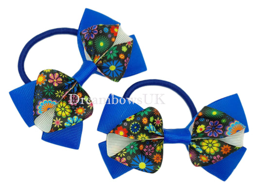 Royal blue and black floral hair bows on thick bobbles
