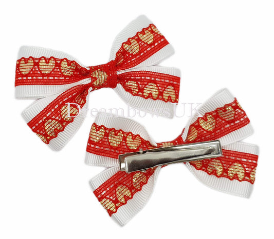 Red and white hair bows on alligator clips