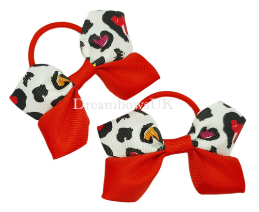 Red, white and black leopard print bows on thick bobbles