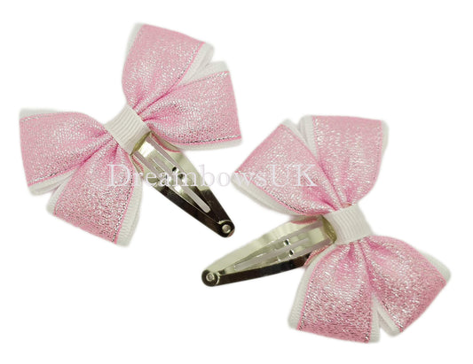 Baby pink and white glitter bows on snap clips