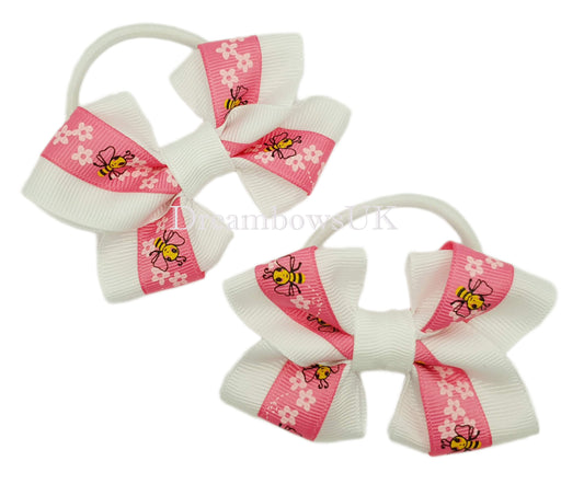 Pink and white hair bows on thick bobbles