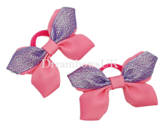 Pink and purple glitter hair bows on polyester bobbles