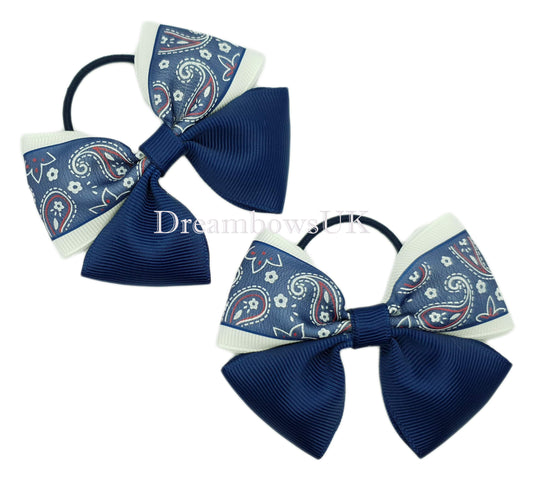 Navy blue and white paisley bows on thin bobbles