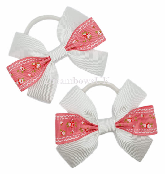 Pink and white floral hair bows on thick bobbles