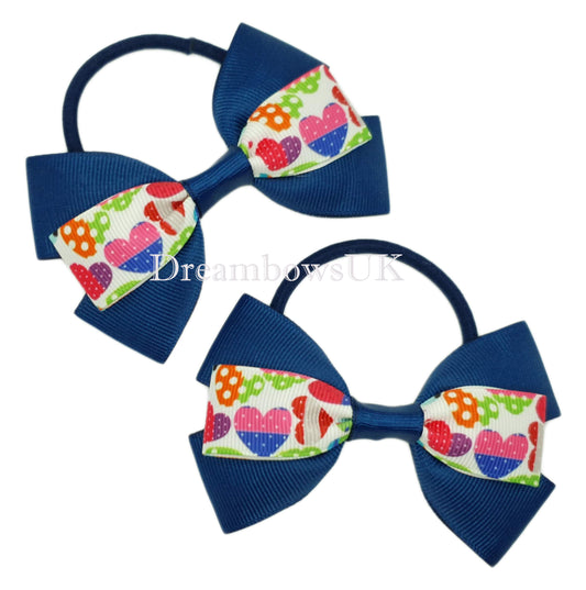 Navy blue hearts design hair bows on thick bobbles
