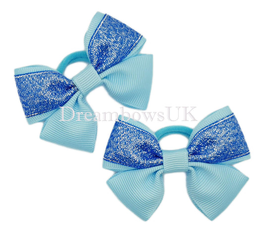 Blue glitter hair bows on polyester bobbles