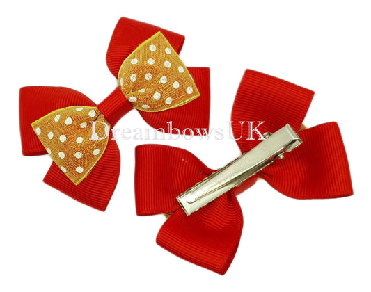 Red and yellow polka dot hair bows on alligator clips