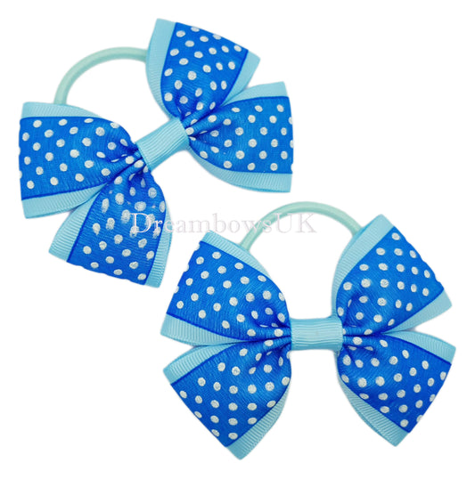 Blue polka dot hair bows on thick bobbles