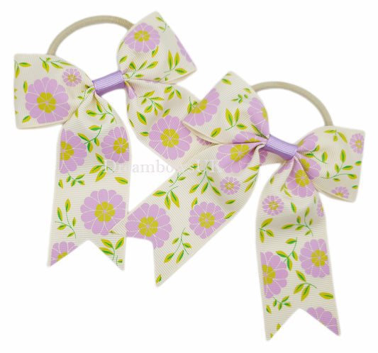 Cream and lilac floral hair bows on thick bobbles