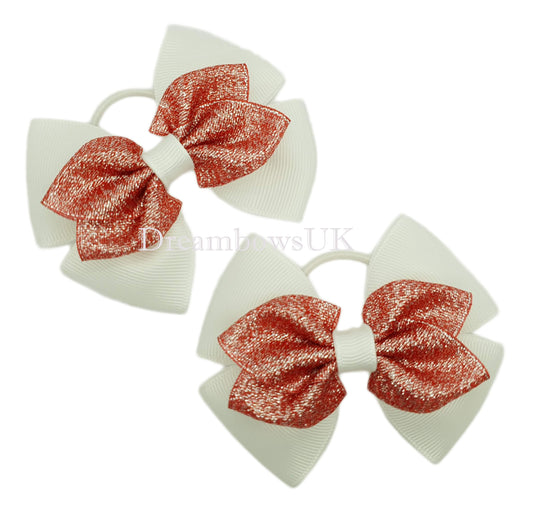 Red and white glitter hair bows on thin bobbles