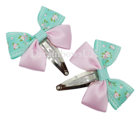 Floral hair bows, snap clips 