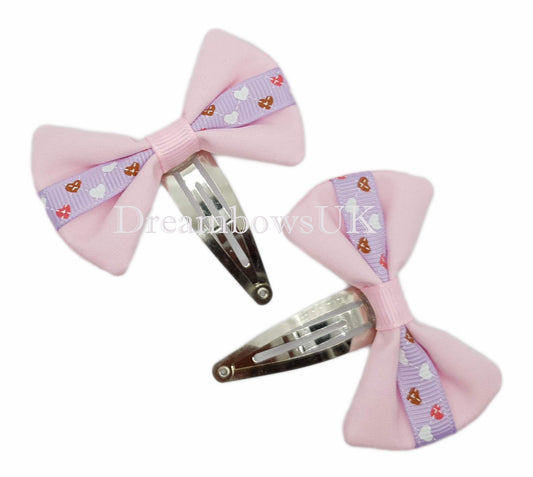 Baby pink and lilac hearts design hair bows on snap clips