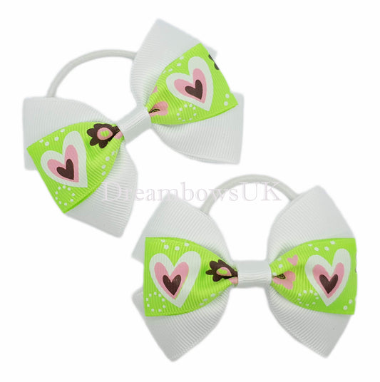 Lime green and white heart design bows on thin bobbles