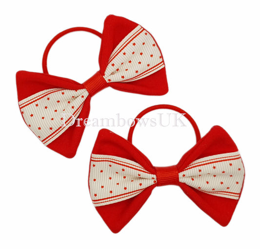 Red and cream stars design hair bows on thin bobbles