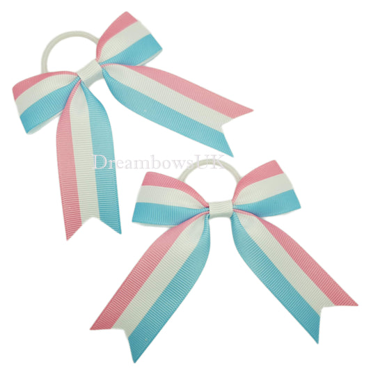 Pink, blue and white striped hair bows on thin bobbles