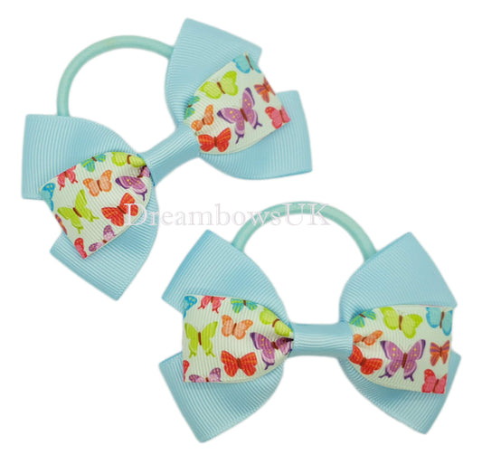 Baby blue butterfly design hair bows on thick bobbles