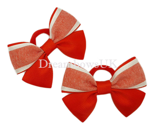 Red and white organza hair bows on polyester bobbles