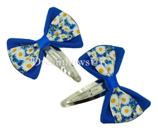 Royal blue floral hair bows on snap clips