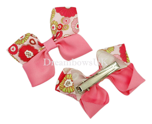 Hot pink floral hair bows on alligator clips