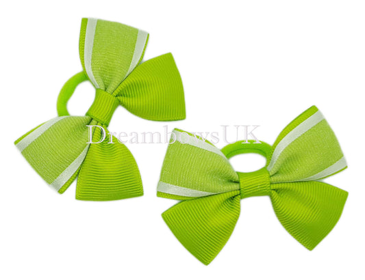 Lime green organza hair bows on polyester bobbles
