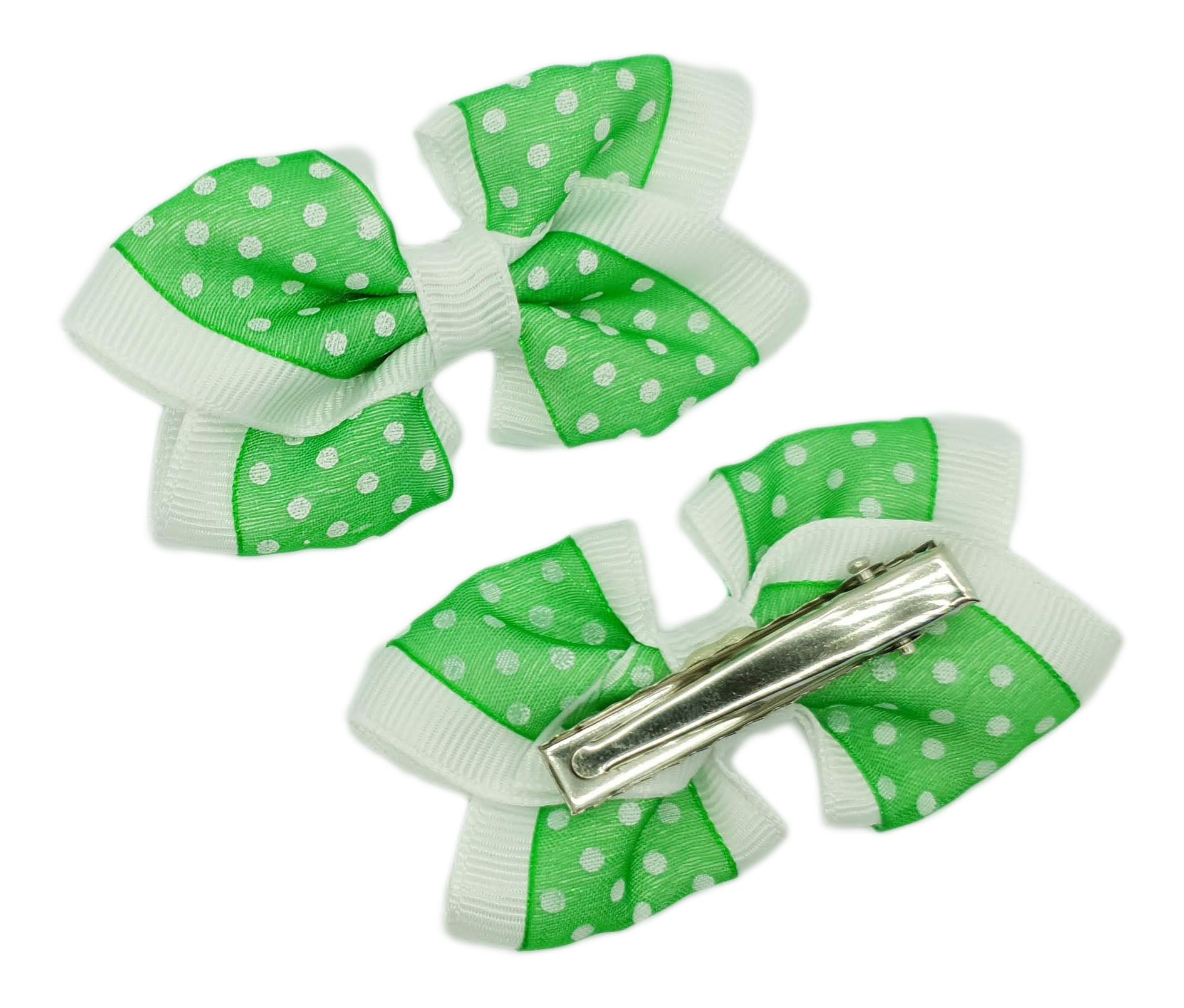 Emerald green and white polka dot bows on alligator clips