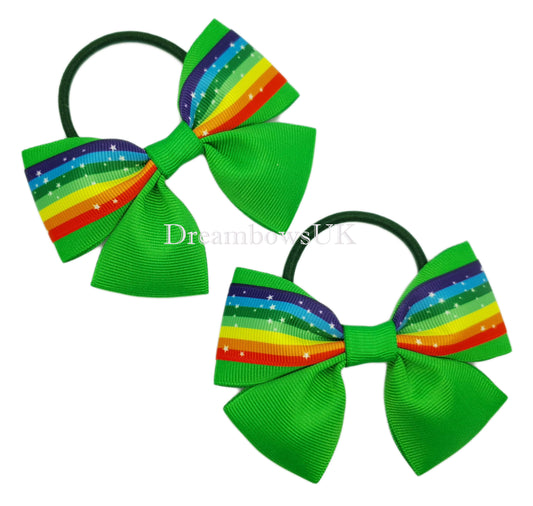 Emerald green and rainbow striped hair bows on thick bobbles