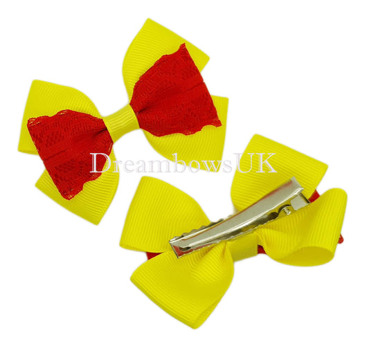 Red and yellow lace hair bows on alligator clips