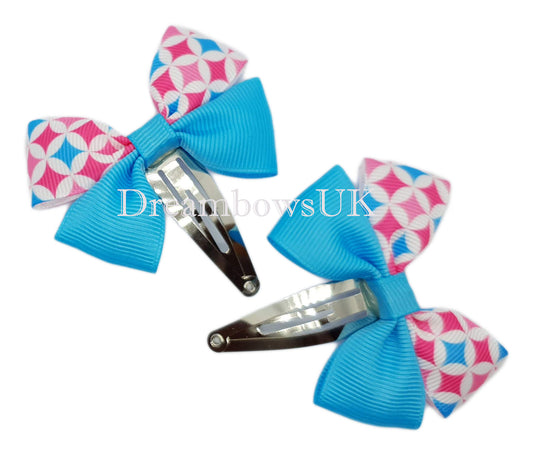 Turquoise novelty hair bows on snap clips