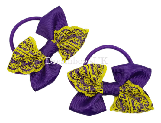 Purple and yellow lace hair bows on thick bobbles 
