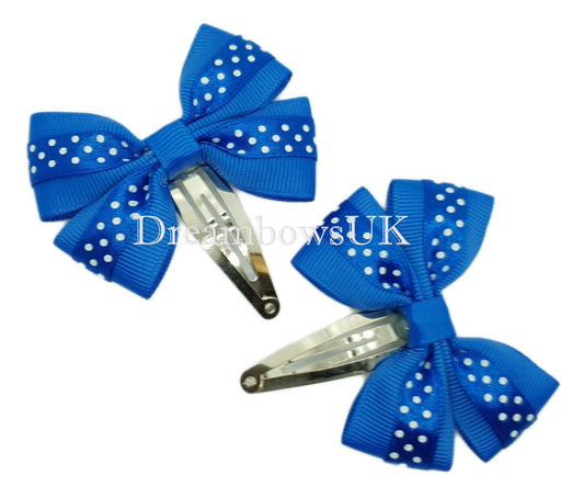 Royal blue polka dot hair bows on snap clips