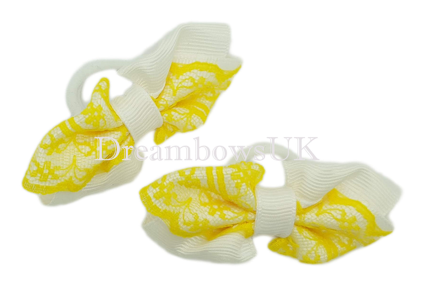 Yellow and white lace hair bows on polyester bobbles