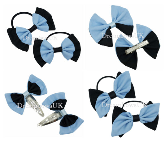2x Black and baby blue fabric hair bows