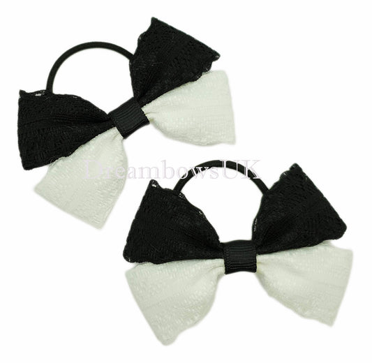 Black and white lace hair bows on thin bobbles
