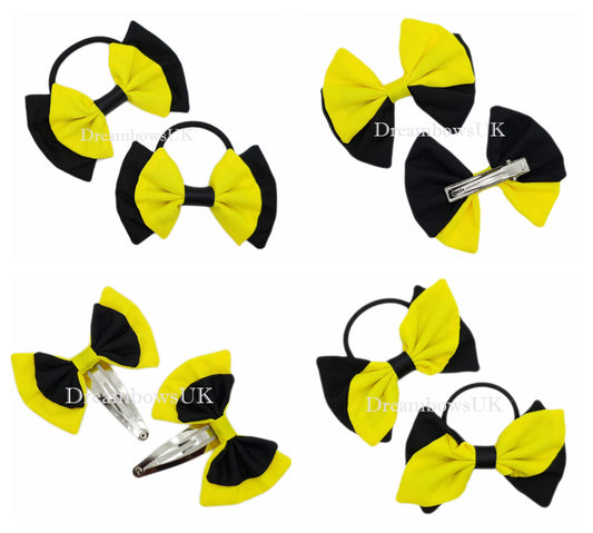 2x Black and yellow fabric hair bows