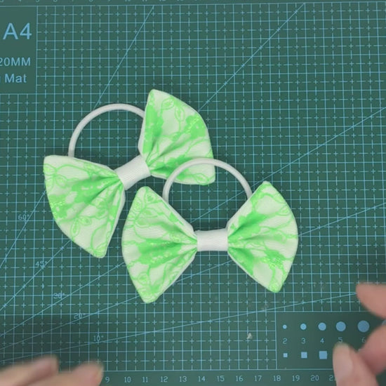 Video of lace hair bows on thick bobbles - Colour - Lime green
