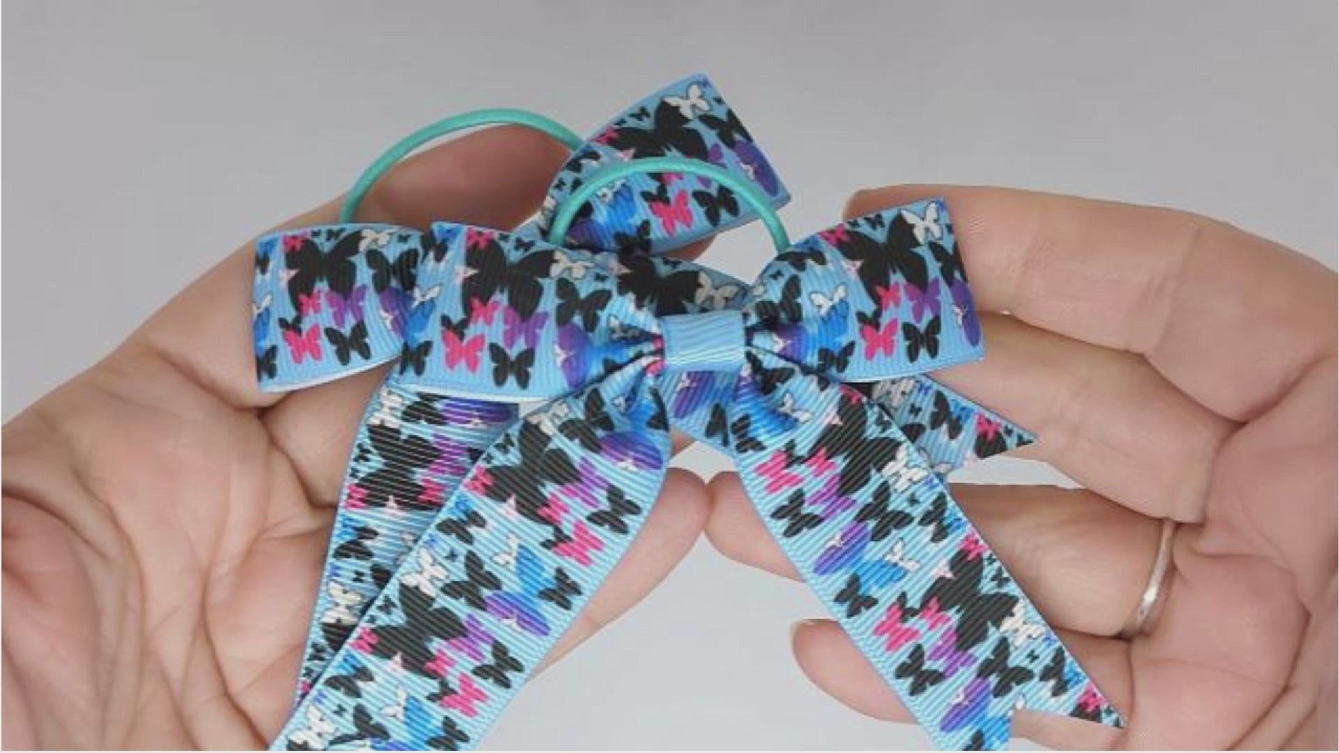 Blue and Black Butterfly Design Hair Bows on Thin Bobbles
