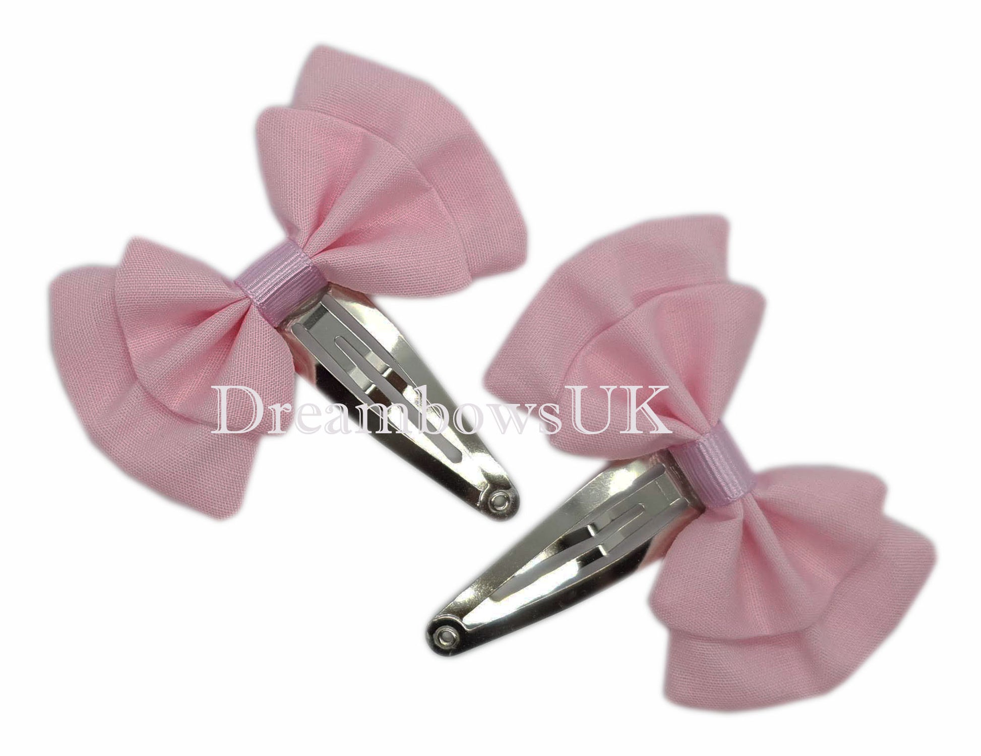 Girls light pink fabric hair bows on snap clips