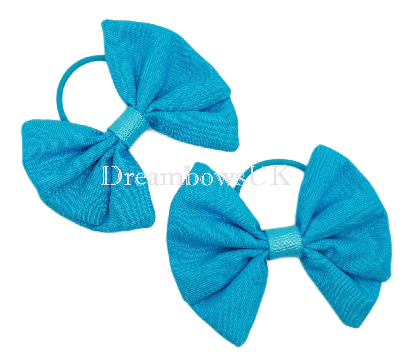Girls turquoise fabric hair bows on thin bobbles