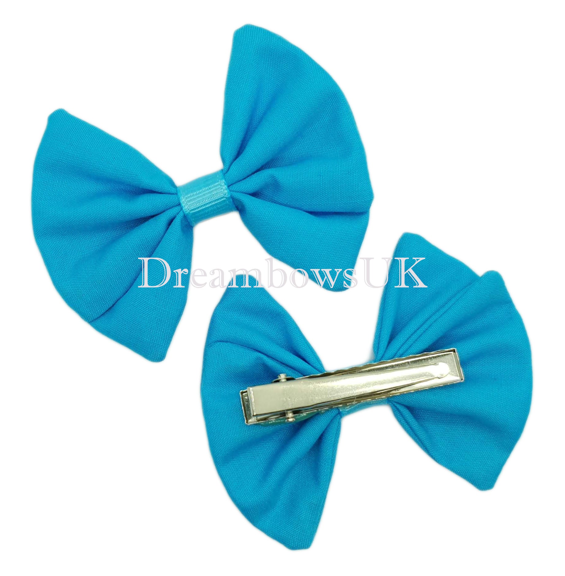 Girls turquoise fabric hair bows on crocodile clips