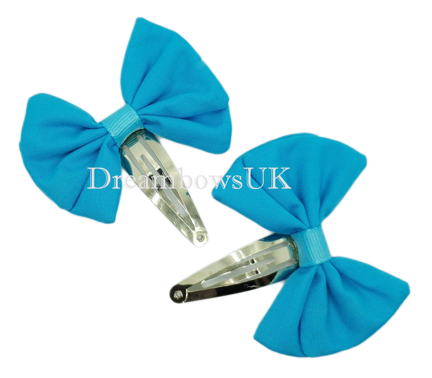 Turquoise fabric hair bows on snap clips