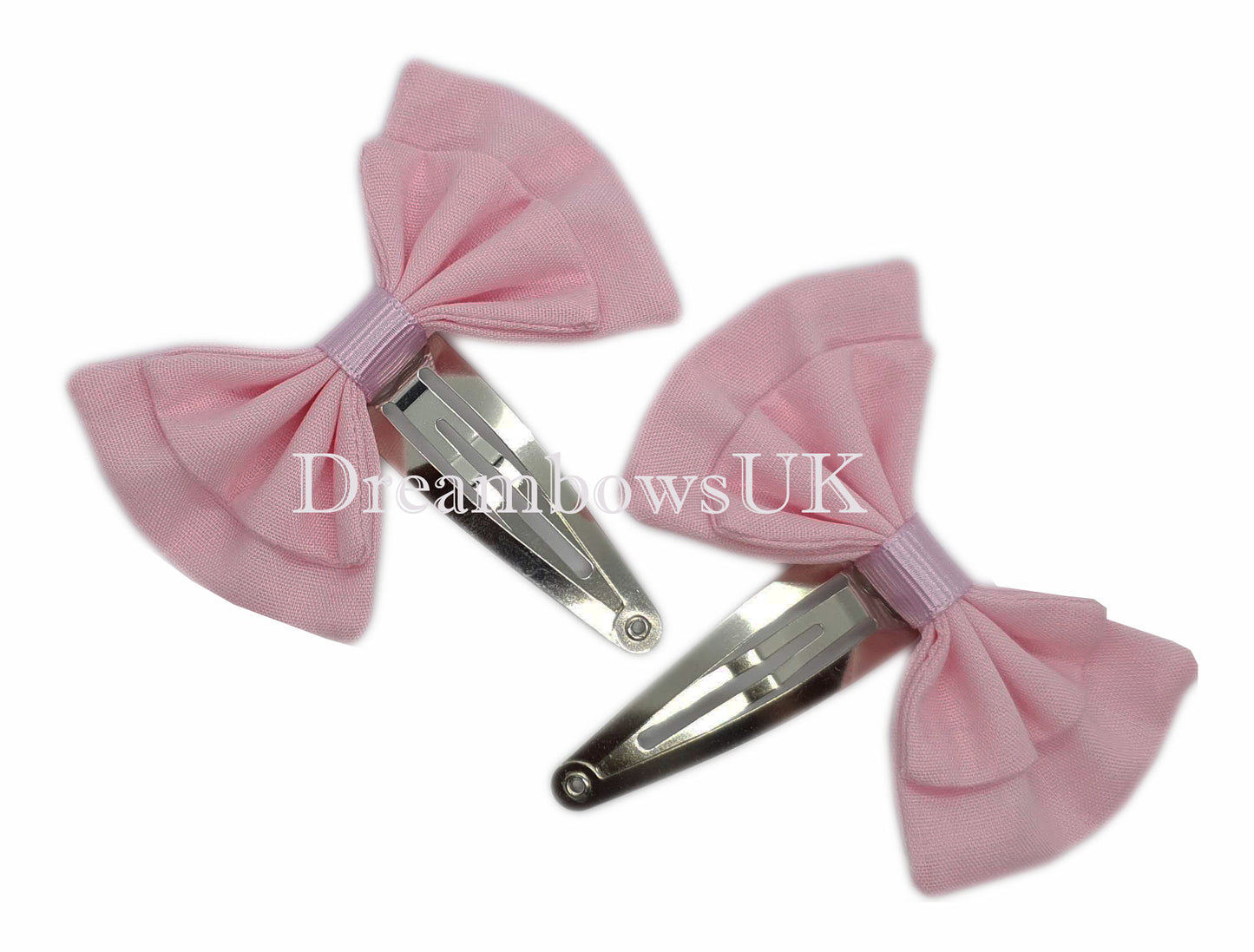 Baby pink custom made fabric hair bows on snap clips