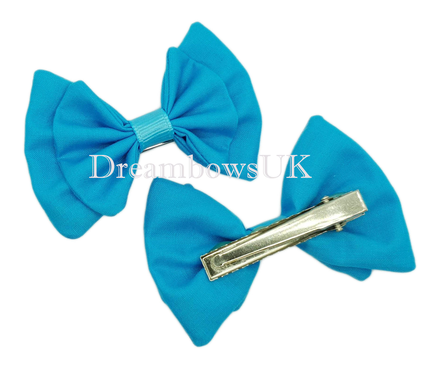 Girls turquoise fabric hair bows on alligator clips